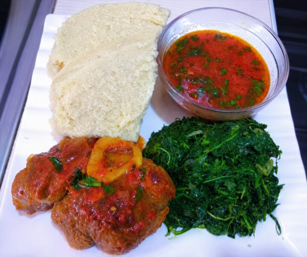 Plate of Ossobuco served with Ugali